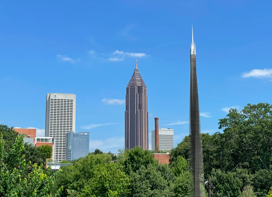 Buildings are pictured surrounded by trees